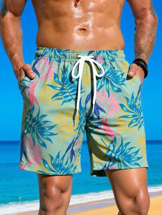 Manfinity Swimmode شورت شاطئ عصري بخصر رباط مطبوع بنمط نباتات استوائية للرجال، شورت شاطئ كاجوال ولطيف للخارج والشاطئ، طراز هاواي