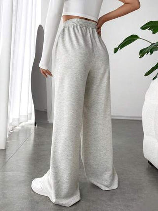 EZwear بنطال واسع متشابك بقدمين غير متماثلين أبيض لموسم الربيع
