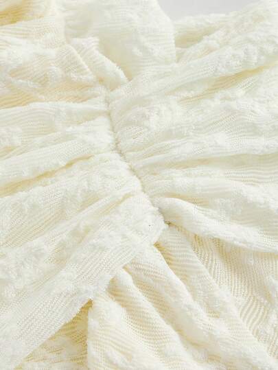 X Belle Mariano MOD فستان ميني قصير بجيب مكشكش أسفل الكتف ونسيج ملمسي