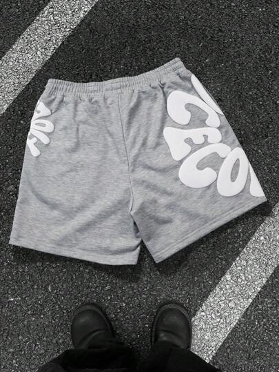 Manfinity LEGND شورت كاجوال للرجال مطبوع عليه حرف، بسحاب للصيف