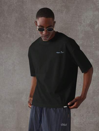 SUMWON تي شيرت كبير الحجم قطع الراحة الكلاسيكية شعار كم قصير ملابس الشارع الفاخرة قياس منتظم أساسي مبسط مجموعة الربيع والصيف