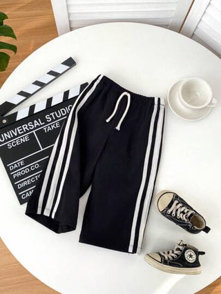 SHEIN بناطيل رياضية واسعة السراويل ذات طراز متنوع وملائم للاستخدام اليومي الكاجوال ، للأطفال الصغار الفتيات والأولاد، مناسبة للارتداء في الأماكن الداخلية والخارجية ،الاستخدام اليومي، الرياضة ،اللعب ،الحفلات ،التصوير الفوتوغرافي ،العطلات ،موسم الربيع والصي