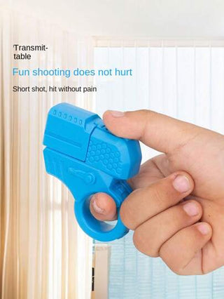 قطعة واحدة لعبة إطلاق صغيرة، لعبة تخفيف الضغط على الأصابع، لعبة مسدس بخاتم الصابع قابل للإطلاق، لعبة إطلاق رائعة، لعبة للمراهقين