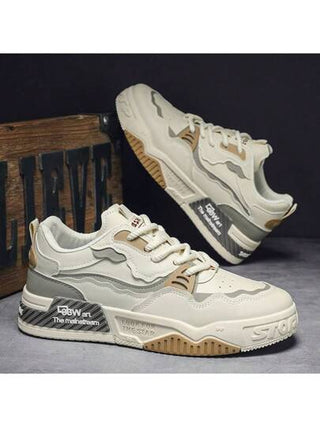 زوج من أحذية رياضية كاجوال للرجال مبطنة بطريقة مريحة، أحذية تزلج بسيطة ومتعددة الاستخدامات