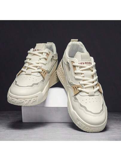 زوج من أحذية رياضية كاجوال للرجال مبطنة بطريقة مريحة، أحذية تزلج بسيطة ومتعددة الاستخدامات