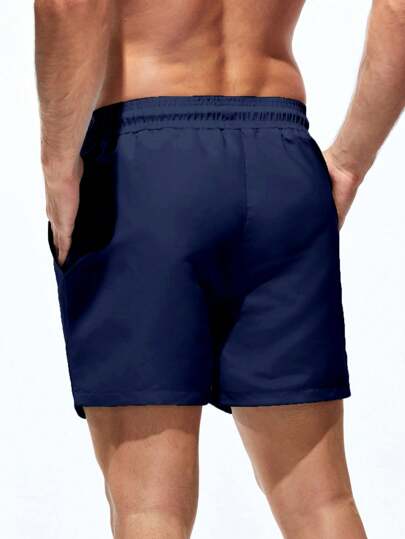 Manfinity Swimmode سروال شاطئ للرجال بخصر رباط ذو لون أحادي مع جيب