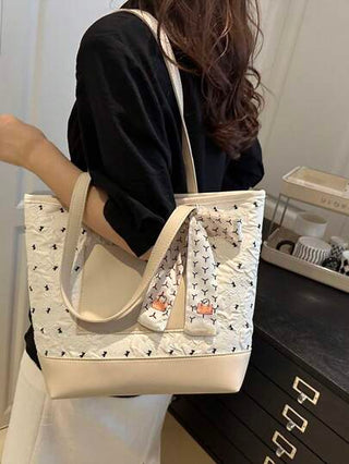 حقيبة كتف بيضاوية جميلة للنساء، موضة جامعية 2025 جديدة ذات سعة كبيرة للتنقل واليومية