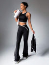 SHEIN Sport Studio طقم بدلة رياضية بلباس علوي بدون أكمام وبنطال مع تريم متباين