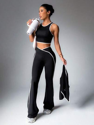 SHEIN Sport Studio طقم بدلة رياضية بلباس علوي بدون أكمام وبنطال مع تريم متباين