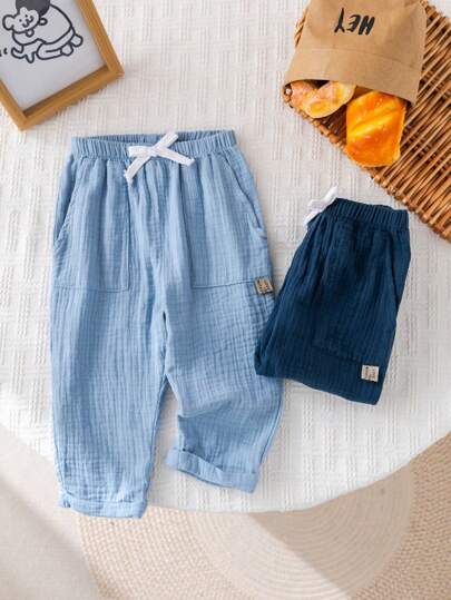 SHEIN مجموعة 2 قطعة من البنطلونات اليومية المريحة ذات الجيوب للأطفال الرضع والصغار، متعددة الاستخدامات لارتداءها في الأماكن المغلقة والخارجية والرياضة واللعب والحفلات والتصوير والعطلات، مناسبة للربيع والصيف