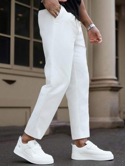 Manfinity Homme بنطال رجالي ساق مستقيمة، بخصر مطاطي وسحاب، مزين بتفاصيل حافة الكاحل