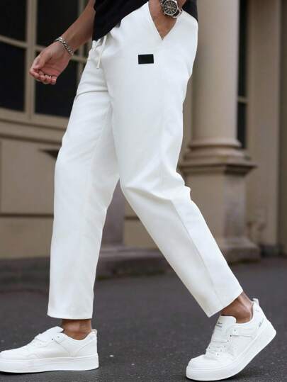 Manfinity Homme بنطال رجالي ساق مستقيمة، بخصر مطاطي وسحاب، مزين بتفاصيل حافة الكاحل