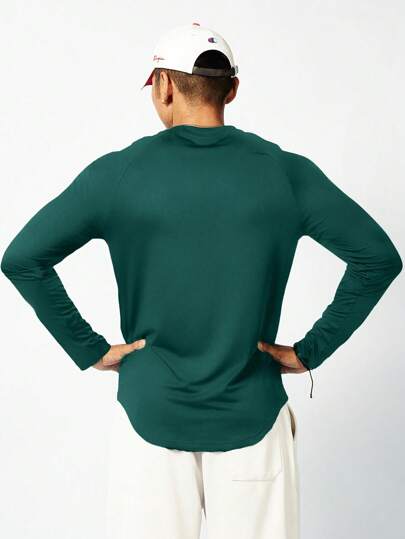 Manfinity Sport Corelite قميص رياضي بأكمام طويلة وذات لون سادة للرجال