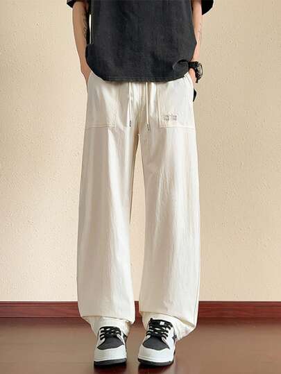 بنطال رجالي مستقيم الساق ذو خصر مطاطي، خفيف الوزن ومنفذ للهواء، مناسب للعطلات الصيفية والربيعية والاستخدام اليومي، أنيق وعصري