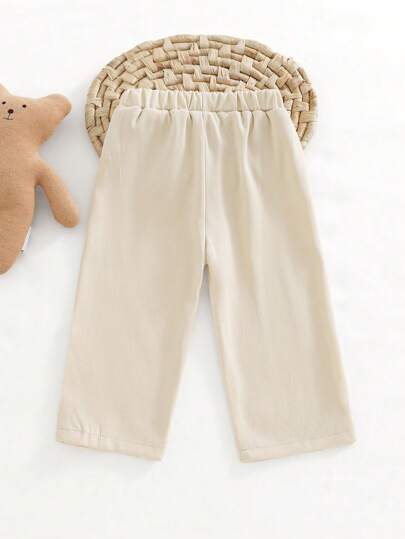 SHEIN Playful Pals بنطلون طويل للأطفال الصغار والرضع من النوع اليومي المريح ذو خصر مطاطي وإقفال بأزرار، بلون بيج، مناسب للارتداء خارج المنزل