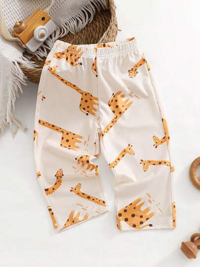 SHEIN Playful Pals بناطيل لياقة للأطفال الصغار من النوع المنقش برسوم الزرافة كارتونية حلوة، بخصر مطاطي مريح