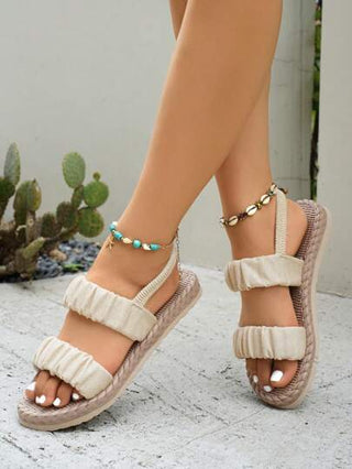 صنادل شبشب أنثوية ربيعية خفيفة الوزن ذات قاعدة ناعمة شبه كتانية مرنة، مفتوحة اﻷصابع ومفتوحة الكعب، مناسبة للطقس الحار والشاطئ والرحلات والأجواء غير الرسمية