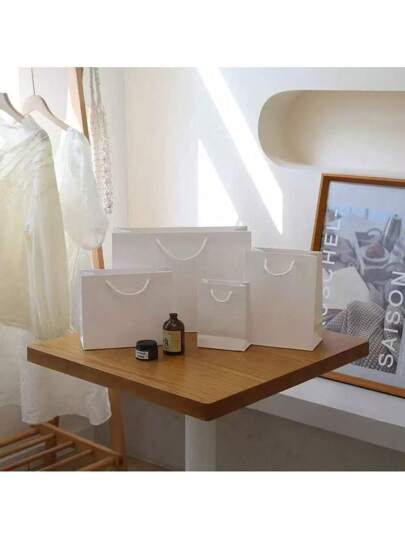 10 أكياس هدايا بيضاء مع مقابض - للحرفيين ومنظمي الحفلات ومقدمي الهدايا، مناسبة للأعراس والأعياد الميلادية والحفلات والأعمال اليدوية وتخزين المجوهرات - بني وردي (4 * 5 * 2 بوصة) أكياس هدايا صغيرة إلى متوسطة الحجم