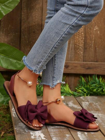 حذاء شبشب نسائي مريح بمقاسات كبيرة، بطراز بسيط وأنيق برؤوس مدورة مزين بفيونكة وخرزات معدنية، شبشب كاجوال للصيف للشاطئ وللاستخدام اليومي