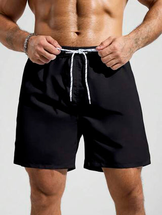 Manfinity Swimmode شورت شاطئ ذو لون سادة مع جيب وخصر جذب، مناسب للصيف