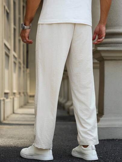 Manfinity Homme بناطيل كاجوال للرجال ذات لون أحادي مع خصر سحاب و جيوب، ضيقة في أسفل الساق