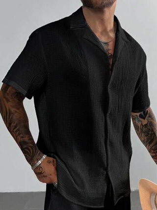 ملابس رجالية كاجوال للعطلات، مثالية للخروجات الصيفية والاستخدام اليومي، تتميز بقميص كم قصير بتصميم فضفاض بلون أحادي كلاسيكي مع إغلاق بأزرار.