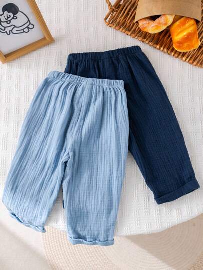 SHEIN مجموعة 2 قطعة من البنطلونات اليومية المريحة ذات الجيوب للأطفال الرضع والصغار، متعددة الاستخدامات لارتداءها في الأماكن المغلقة والخارجية والرياضة واللعب والحفلات والتصوير والعطلات، مناسبة للربيع والصيف