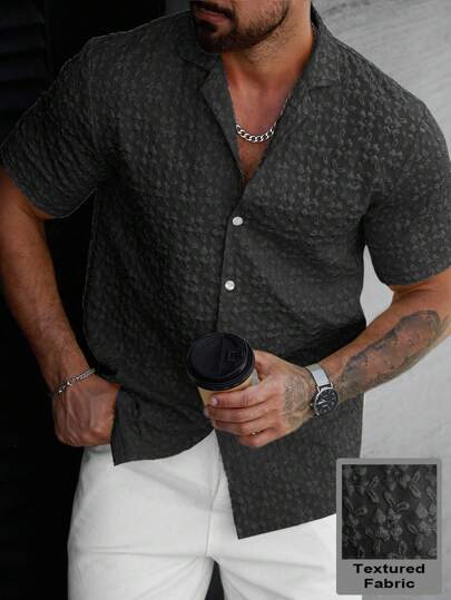 Manfinity Homme قميص كاجوال للرجال بلون سادة، ملمس نسيجي، أزرار، صيفي