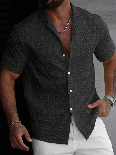 Manfinity Homme قميص كاجوال للرجال بلون سادة، ملمس نسيجي، أزرار، صيفي