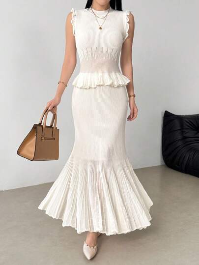 Modelyn مجموعة من 2 قطعة تتكون من سترة صوفية بدون أكمام وتنورة طويلة مطوية بأناقة