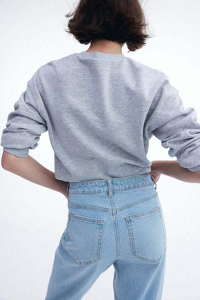 بنطلون جينز ضيق ومستقيم القصة حتى الكاحل