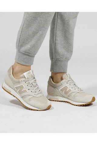 حذاء رياضي كاجوال للجنسين باللون البيج Ml565 New Balance