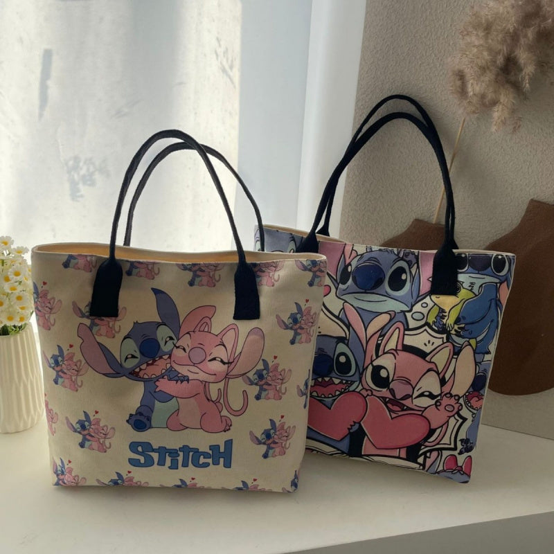 حقيبة كتف كبيرة السعة من ستيتش وليلو - طباعة كرتونية ملونة، حقيبة كتف قماشية بسحاب، متينة ومتعددة الاستخدامات للتنقل اليومي والسفر والمزيد، حقيبة كتف للتنقل | تصميم لطيف للعناية بالحقيبة | حقيبة بمقبض قوي، محفظة مبتكرة