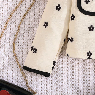 موضة 2025 خريف/شتاء جديد بنت sweet طقم black small flower printed توب+solid color yarn جيب 2-piece طقم