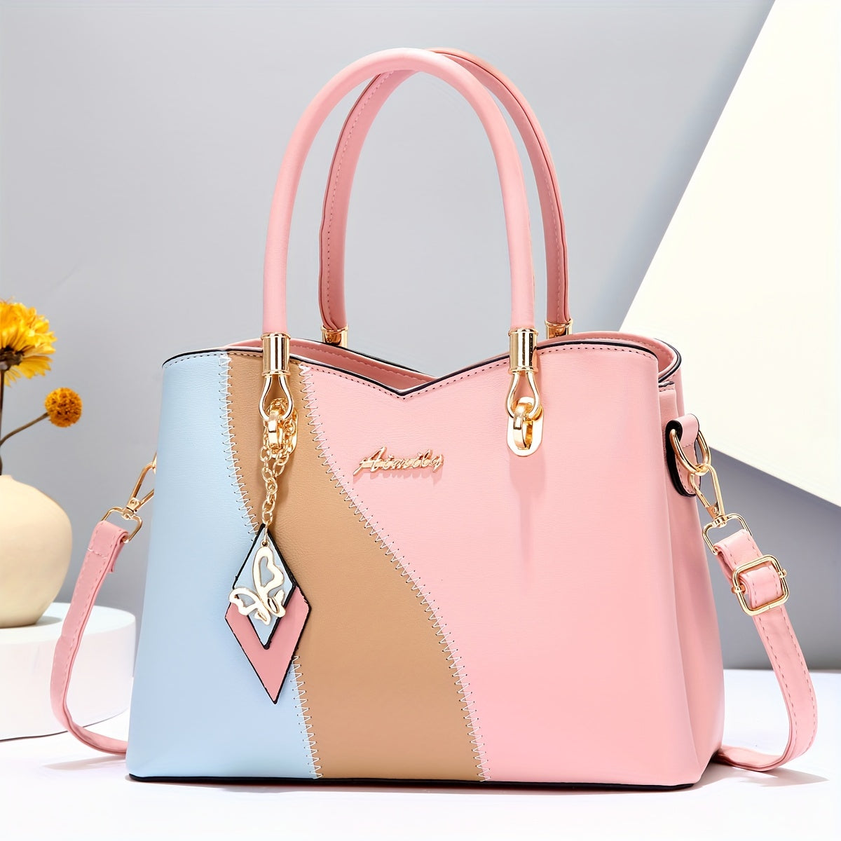 حقيبة يد نسائية أنيقة بسعة كبيرة، بتصميم أنيق للقطع المربوطة، مثالية للارتداء على الكتف والجسم بشكل متقاطع.