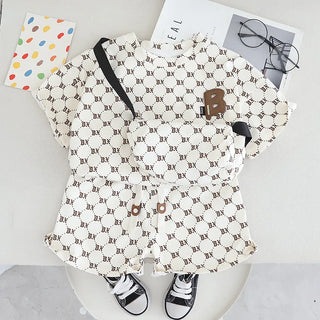 موضة 2025 جديد korean ستايل أولاد صيف بدلة أكمام قصيرة two-piece baby clothes with leopard logo design for أطفال