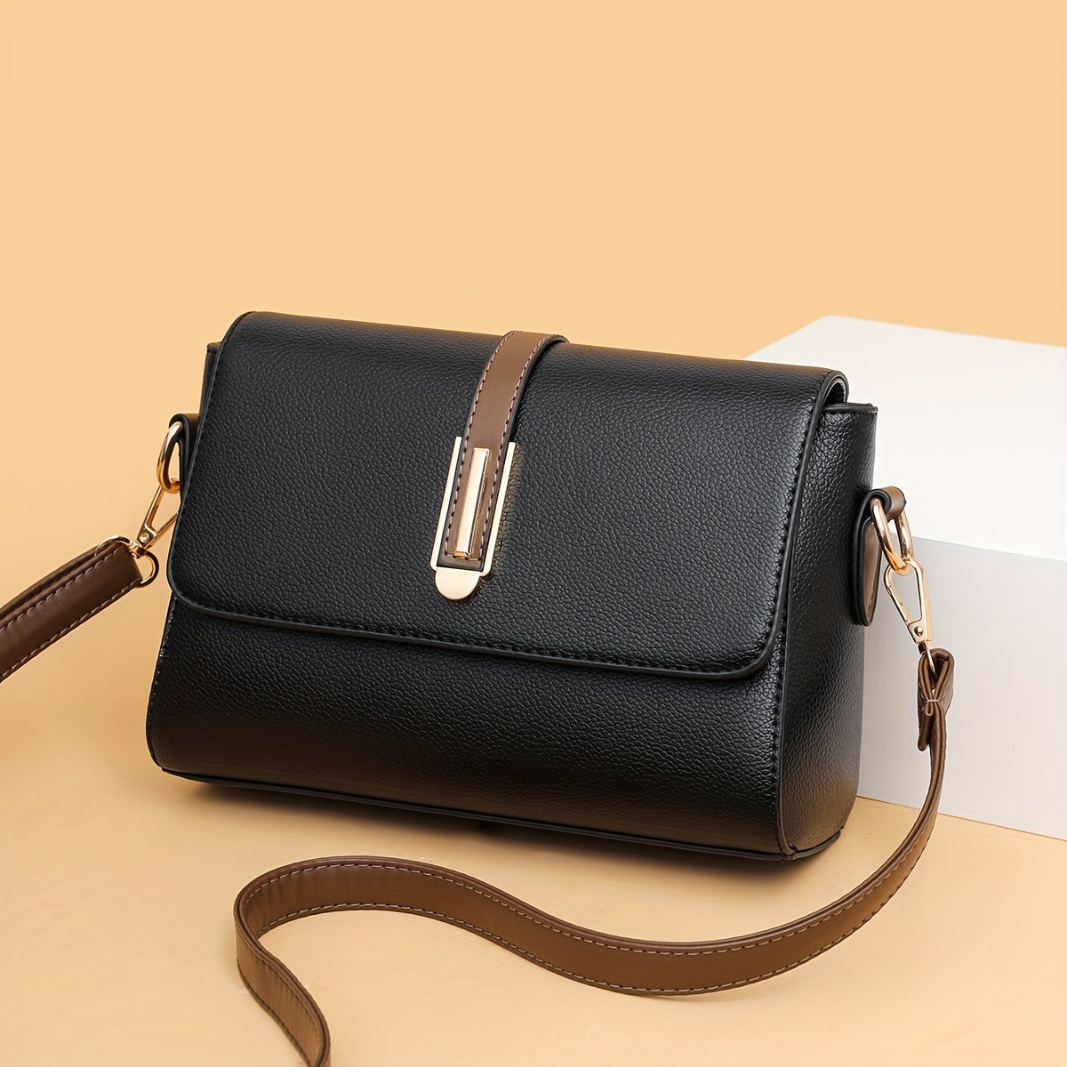 حقيبة كروس أنيقة ومتعددة الاستخدامات مع تصميم ريترو بسيط وحواف معدنية