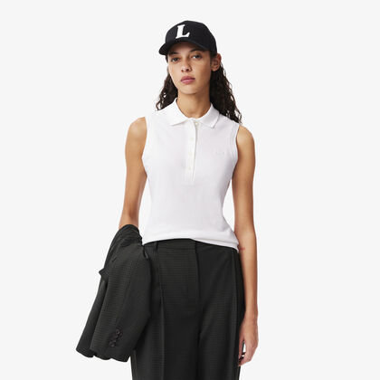 قميص بولو مطاطي بدون أكمام L.12.d بقصة ضيقة Lacoste