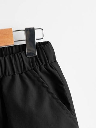 SHEIN بناطيل كارجو للمراهقين مزودة بخصر مطاطي وسحاب ثنائي اللون وجيوب مائلة