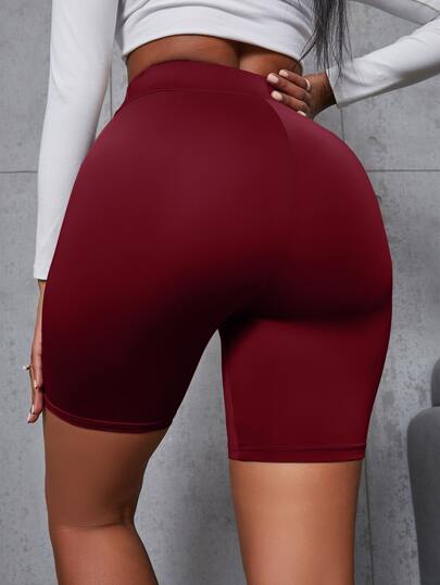 Flirla شورتات ركوب الدراجات النارية شريط خصر واسع موحدة اللون