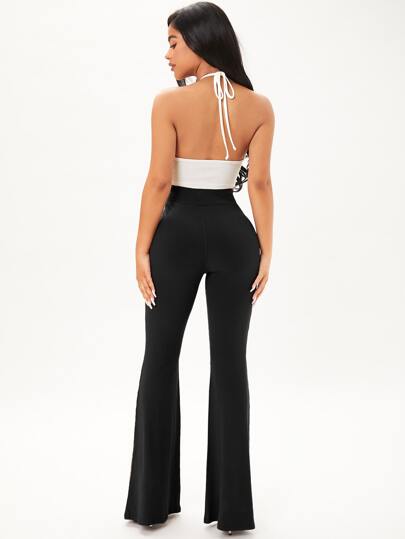 SHEIN SXY بنطلون فلير سادة بحياكة مضلعة