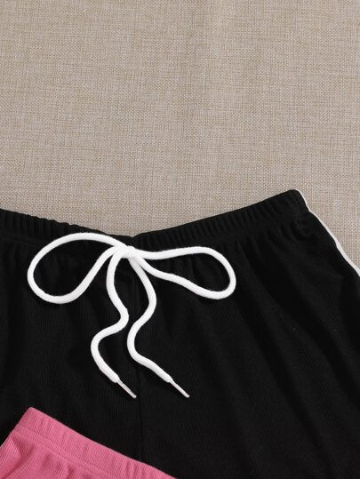 SHEIN EZwear قطعتين من شورتات الخصر التي لها عقدة على شكل الدولفين