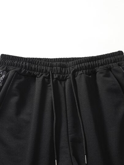 Manfinity Sporsity شورت رجالي واسع فضفاض بطباعة بيزلي ملونة على الجنب مع خصر سحاب مرن، شورت كاجوال ملون مناسب كهدية للزوج أو الحبيب