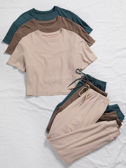 SHEIN 3 مجموعات من طقم ملابس المنزل متكون من تي شيرت بلون واحد وبنطلون ربطة أمامية
