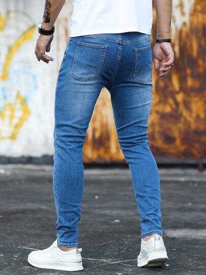 Manfinity Homme بنطلون جينز رجالي بطيّة السحاب، قصة ضيقة، بلون أزرق داكن مغسول، بتصميم سكيني، من القطن ، بطراز سروال جيب للرجال