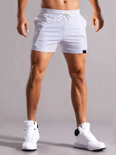 Manfinity Homme شورت رجالي بخصر مربوط بسحاب وتفاصيل رقعة