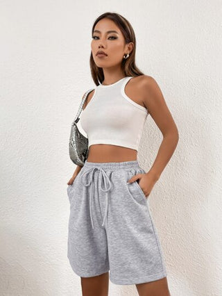 EZwear بنطلون قصير موحدة اللون خصر معقود جيب مائل