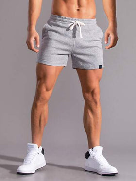 Manfinity Homme شورت رجالي كاجوال رمادي فاتح مع حبل شد الخصر وتفاصيل رقعة