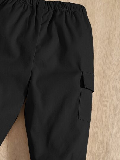 SHEIN بنطلون طويل قابل للارتداء مع جيوب بألوان صلبة لأولاد الأطفال، مناسب للارتداء في فصلي الخريف والشتاء