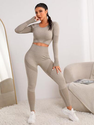 SHEIN Sport Studio مجموعة رياضية نسائية تتضمن سترة فوقية ولباس سفلي رياضي ذات فتحات للإبهام قابلة لشد عالي ومفروم بشكل متناسق